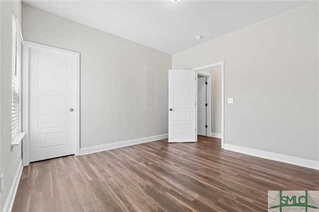 314 Providence Trce, Statesboro, GA 30461 - unfurnished bedroom with wood finished floors and baseboards