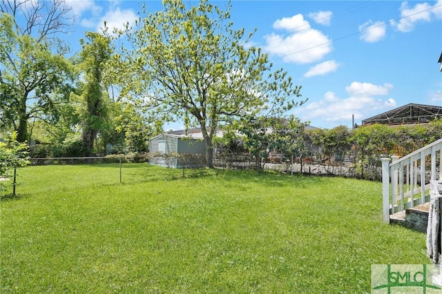 view of yard with fence