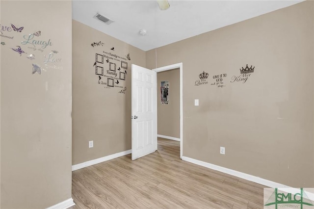 633 W 39th St, Savannah, GA 31415 - spare room with light wood finished floors, baseboards, and visible vents