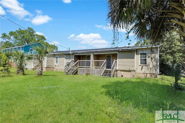 633 W 39th St, Savannah, GA 31415 - back of house featuring crawl space, a yard, and a porch
