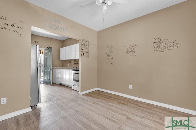633 W 39th St, Savannah, GA 31415 - interior space with light wood-style flooring, ceiling fan, and baseboards