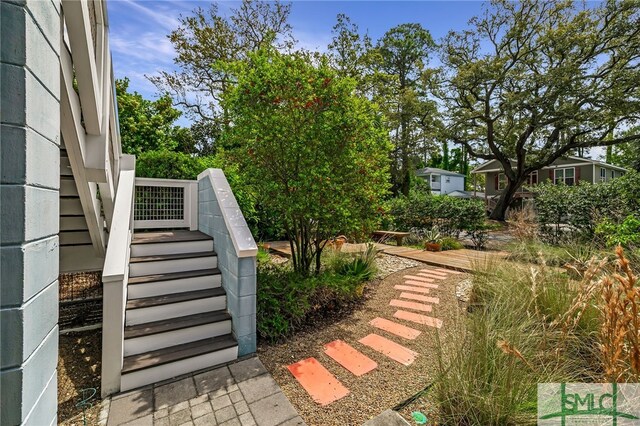 1111 Laurel Ave, Tybee Island, GA 31328 - view of yard with stairway