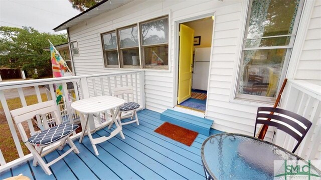 712 2nd Ave, Tybee Island, GA 31328 - deck featuring outdoor dining space