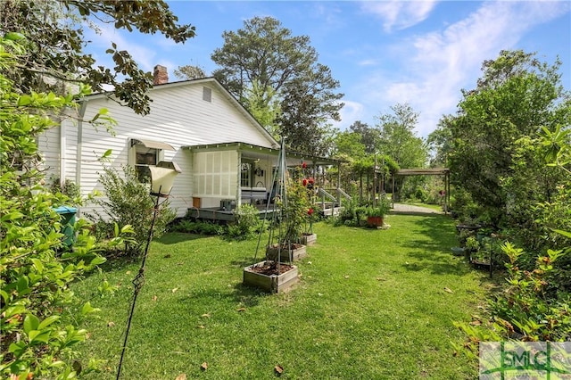 103 Church St, Bloomingdale, GA 31302 - view of yard with a carport and a garden