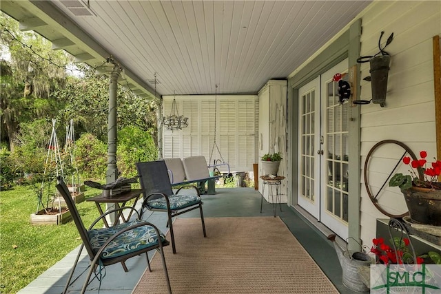 103 Church St, Bloomingdale, GA 31302 - view of patio / terrace with french doors, covered porch, and visible vents