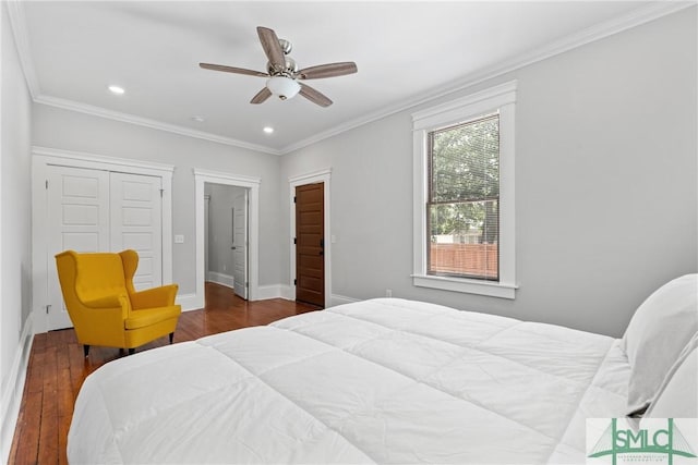 bedroom with hardwood / wood-style floors, crown molding, and recessed lighting