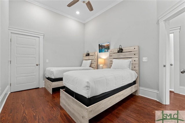 bedroom featuring crown molding, baseboards, recessed lighting, and dark wood finished floors