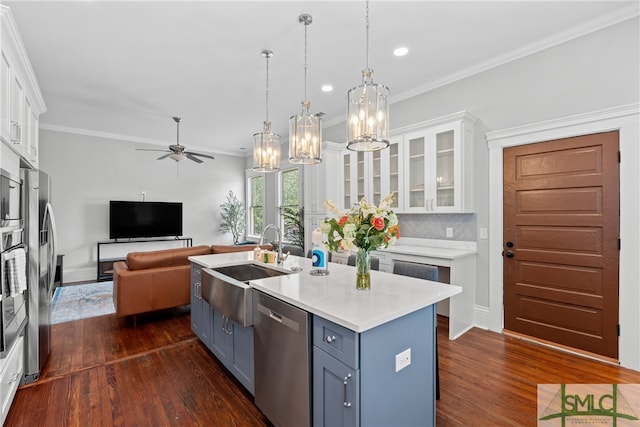 kitchen featuring white cabinetry, dark wood-style floors, and stainless steel appliances