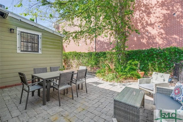 view of patio featuring outdoor dining space