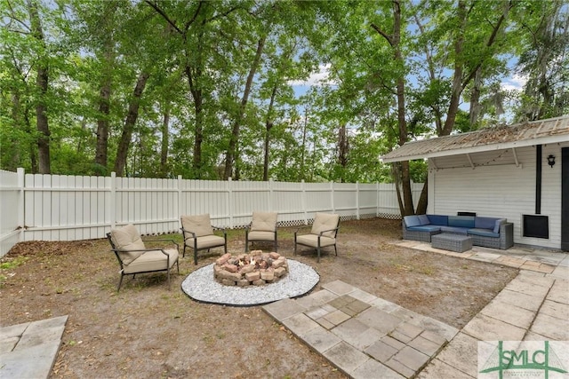605 Weisenbaker Rd, Rincon, GA 31326 - view of patio with an outdoor living space with a fire pit and a fenced backyard
