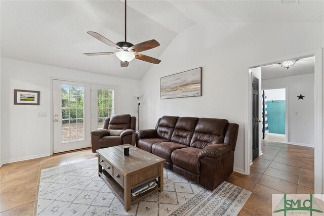 605 Weisenbaker Rd, Rincon, GA 31326 - living area with light tile patterned floors, baseboards, vaulted ceiling, and ceiling fan with notable chandelier