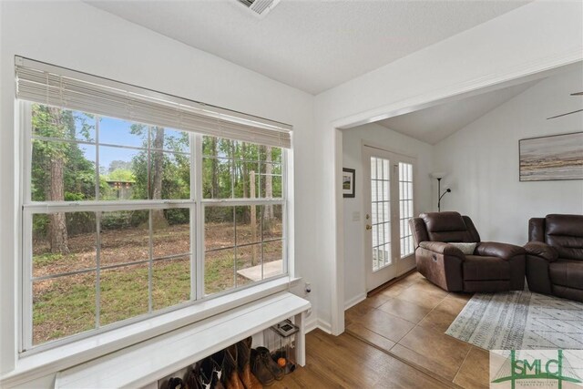605 Weisenbaker Rd, Rincon, GA 31326 - interior space featuring a healthy amount of sunlight, visible vents, baseboards, and lofted ceiling