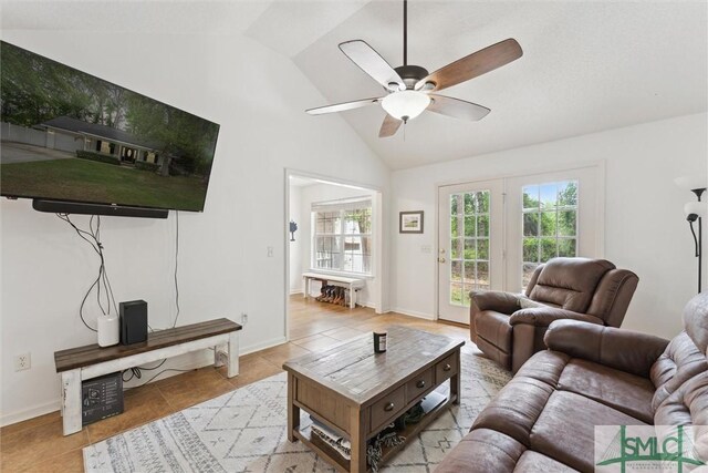 605 Weisenbaker Rd, Rincon, GA 31326 - living room featuring tile patterned floors, baseboards, a ceiling fan, and lofted ceiling