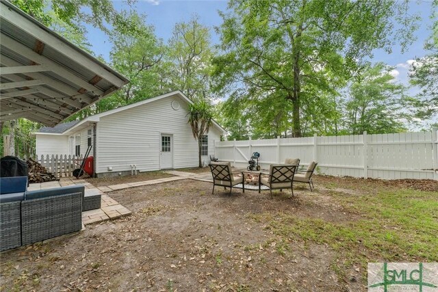 605 Weisenbaker Rd, Rincon, GA 31326 - view of yard with a patio area, a fire pit, and fence private yard