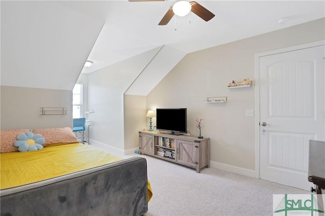 bedroom with carpet, ceiling fan, baseboards, and lofted ceiling