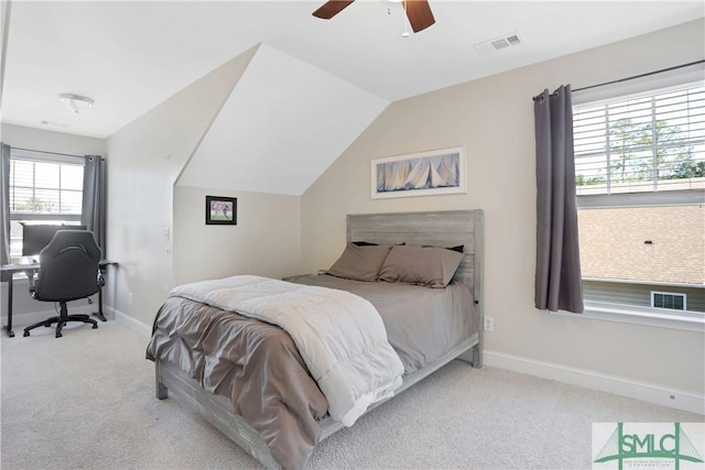 carpeted bedroom featuring a ceiling fan, baseboards, lofted ceiling, and visible vents