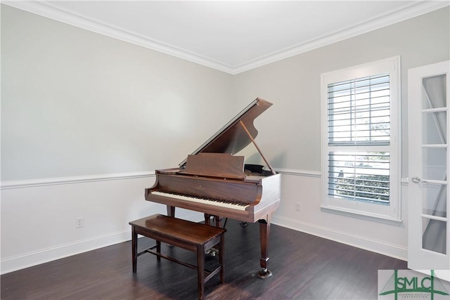 sitting room featuring wood finished floors, ornamental molding, and plenty of natural light
