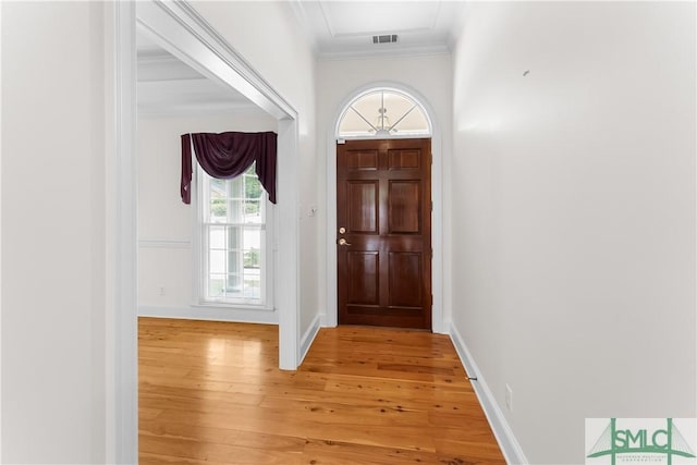 16 Oak Park Pt, Savannah, GA 31405 - doorway to outside featuring light wood-type flooring, ornamental molding, baseboards, and visible vents