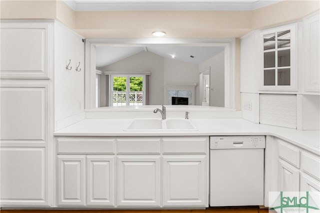 16 Oak Park Pt, Savannah, GA 31405 - kitchen with white dishwasher, light countertops, a sink, lofted ceiling, and white cabinetry