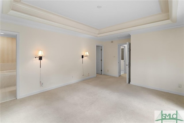 16 Oak Park Pt, Savannah, GA 31405 - carpeted empty room featuring crown molding, a tray ceiling, and baseboards