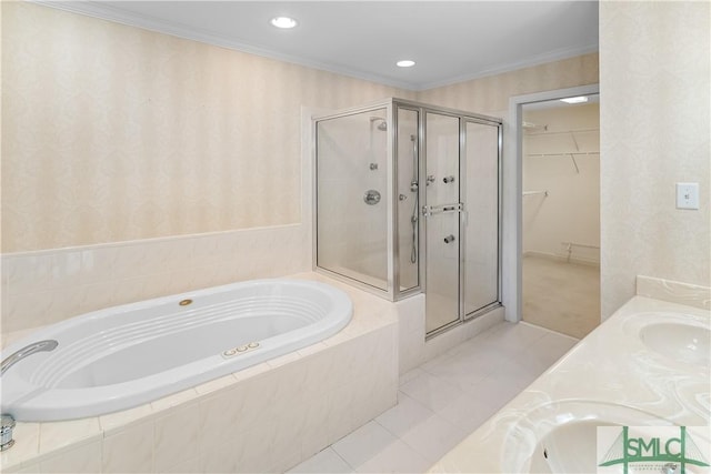 16 Oak Park Pt, Savannah, GA 31405 - full bath featuring tile patterned flooring, a garden tub, a walk in closet, a shower stall, and a sink