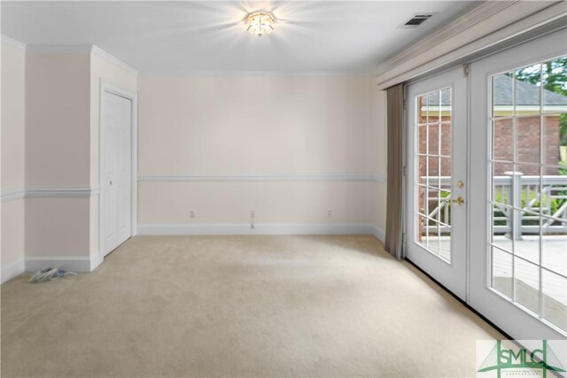 16 Oak Park Pt, Savannah, GA 31405 - carpeted spare room with crown molding, baseboards, french doors, and visible vents