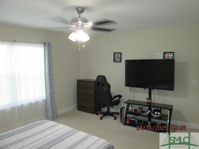 25 Frank Edwards Rd, Ellabell, GA 31308 - carpeted bedroom featuring ceiling fan and baseboards
