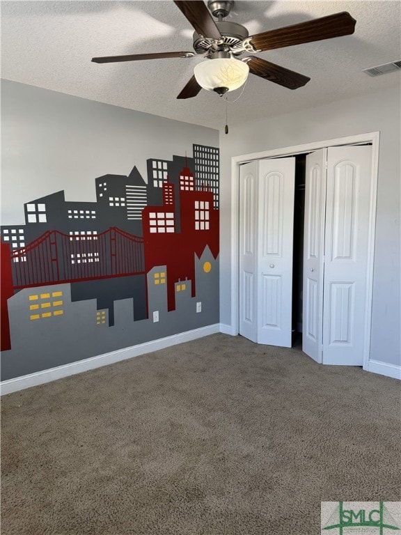 204 Grandview Dr, Hinesville, GA 31313 - unfurnished bedroom with a textured ceiling, baseboards, visible vents, carpet, and a closet
