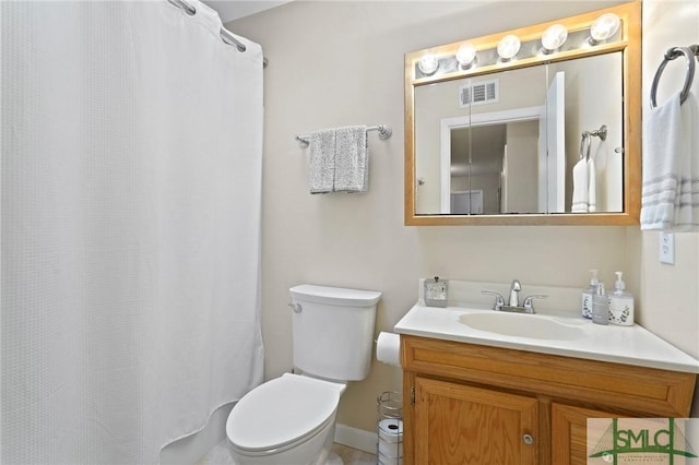 full bathroom with visible vents, toilet, a shower with shower curtain, and vanity