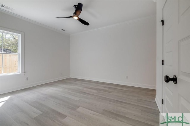 1615 Le Grand St, Savannah, GA 31401 - empty room with light wood-style flooring, baseboards, visible vents, a ceiling fan, and crown molding