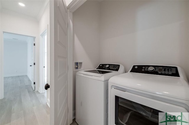 1615 Le Grand St, Savannah, GA 31401 - washroom featuring washing machine and dryer, light wood finished floors, recessed lighting, and laundry area