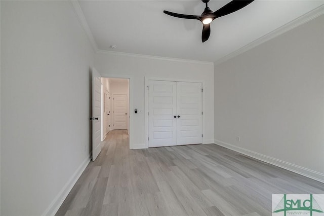 1615 Le Grand St, Savannah, GA 31401 - unfurnished bedroom featuring baseboards, light wood-style floors, a closet, ceiling fan, and ornamental molding