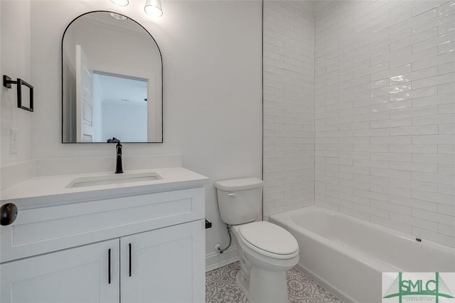 1615 Le Grand St, Savannah, GA 31401 - bathroom featuring baseboards, toilet, vanity, and tile patterned floors