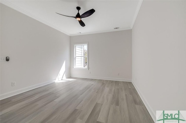 1615 Le Grand St, Savannah, GA 31401 - unfurnished room featuring light wood finished floors, baseboards, visible vents, ceiling fan, and crown molding