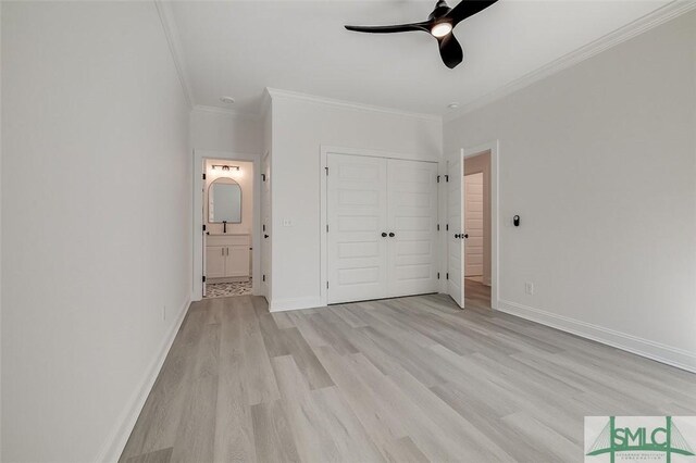 1615 Le Grand St, Savannah, GA 31401 - unfurnished bedroom with crown molding, ensuite bathroom, a closet, light wood finished floors, and baseboards