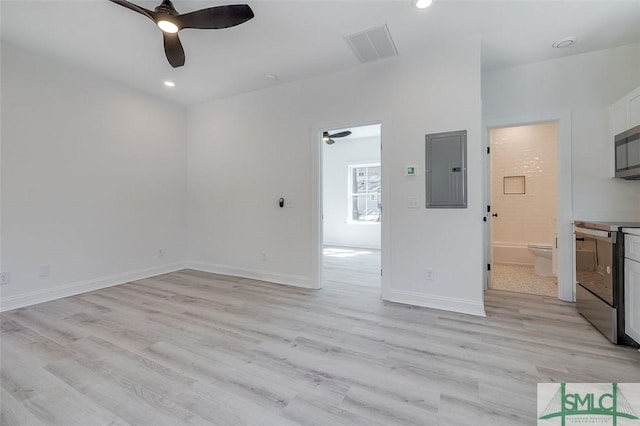 1615 Le Grand St, Savannah, GA 31401 - unfurnished living room with recessed lighting, light wood-style flooring, electric panel, and a ceiling fan