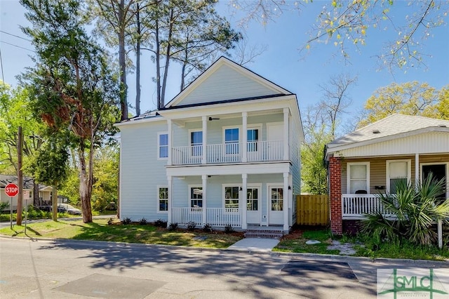 1615 Le Grand St, Savannah, GA 31401 - view of front of home featuring a porch, a balcony, and fence