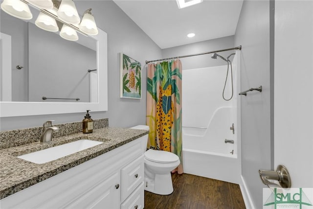 full bathroom with shower / bath combination with curtain, wood finished floors, vanity, and toilet