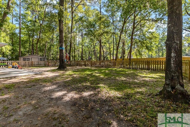 view of yard with fence