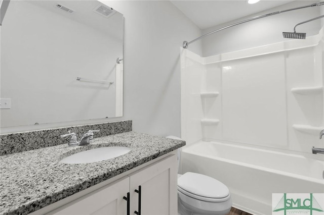 full bathroom featuring tub / shower combination, visible vents, toilet, and vanity