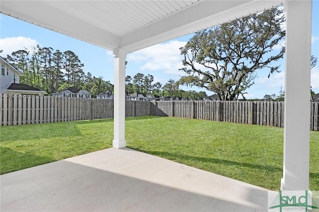 view of yard with a fenced backyard and a patio area