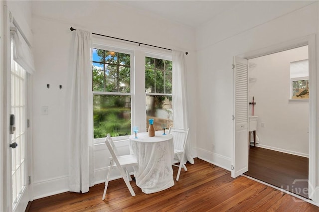 128 E 48th St, Savannah, GA 31405 - dining space with wood finished floors and baseboards