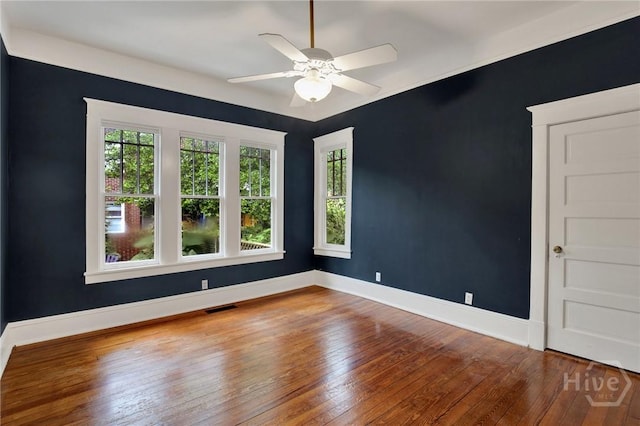 128 E 48th St, Savannah, GA 31405 - empty room with hardwood / wood-style flooring and a ceiling fan