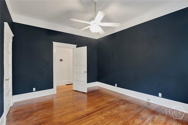 128 E 48th St, Savannah, GA 31405 - spare room with a ceiling fan and wood finished floors