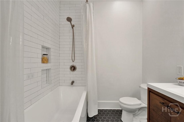 128 E 48th St, Savannah, GA 31405 - bathroom featuring shower / tub combo, vanity, and tile patterned flooring