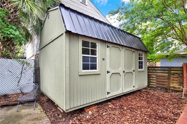128 E 48th St, Savannah, GA 31405 - view of shed featuring a fenced backyard