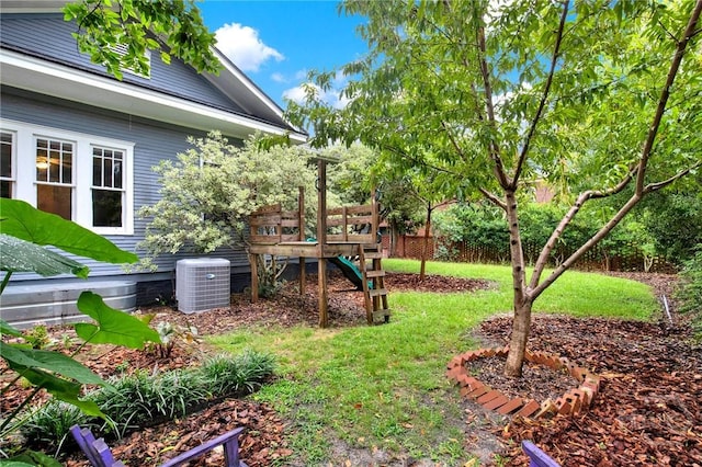 128 E 48th St, Savannah, GA 31405 - view of yard with a wooden deck