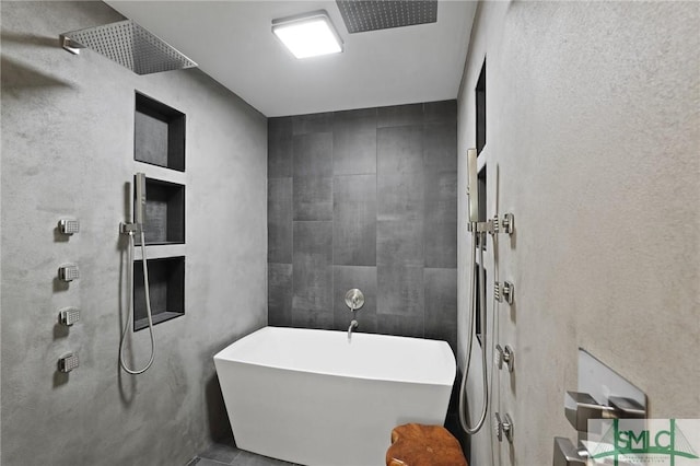 bathroom with a soaking tub