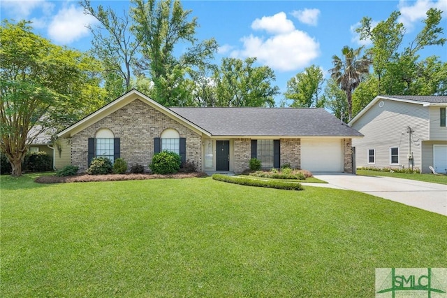 ranch-style home featuring brick siding, an attached garage, driveway, and a front yard