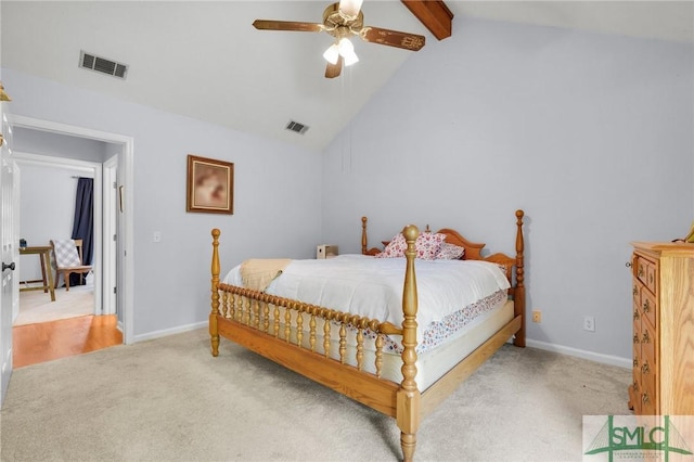 carpeted bedroom with visible vents, vaulted ceiling with beams, and baseboards
